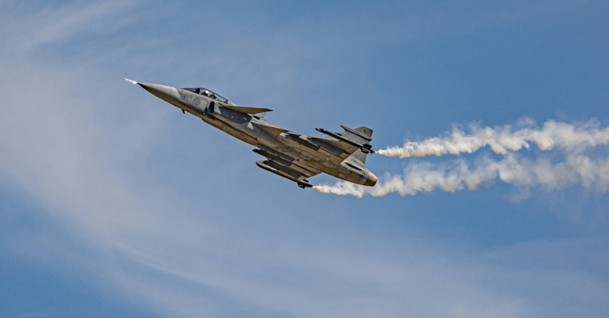 jas 39 gripen with smoke on