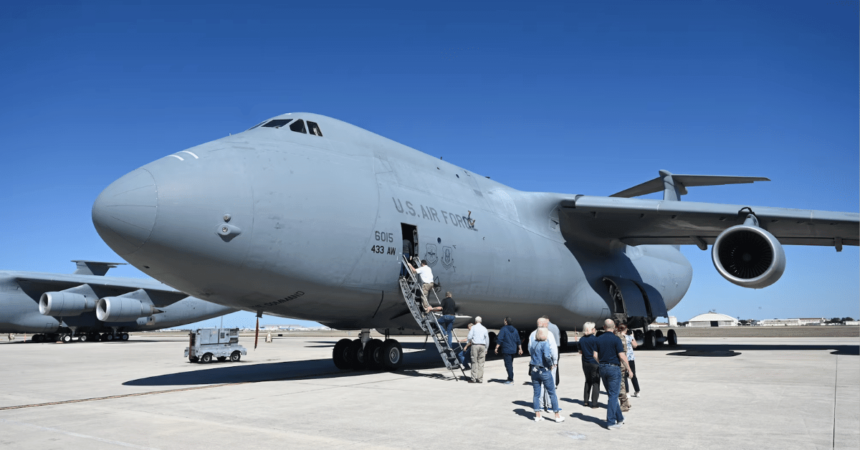 People boarding u.s. air force aircraft